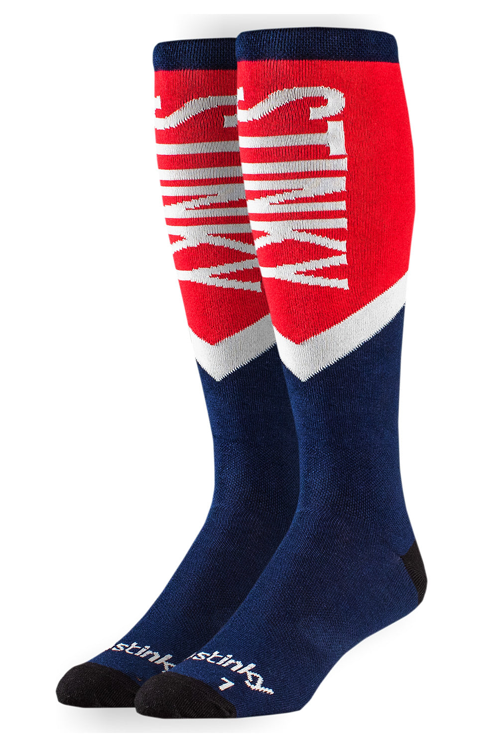 A pair of Stinky socks with a bold red, white, and navy blue color-blocked design, featuring the brand name 'STINKY' in large white letters on the red section and 'stinky' on the toes.