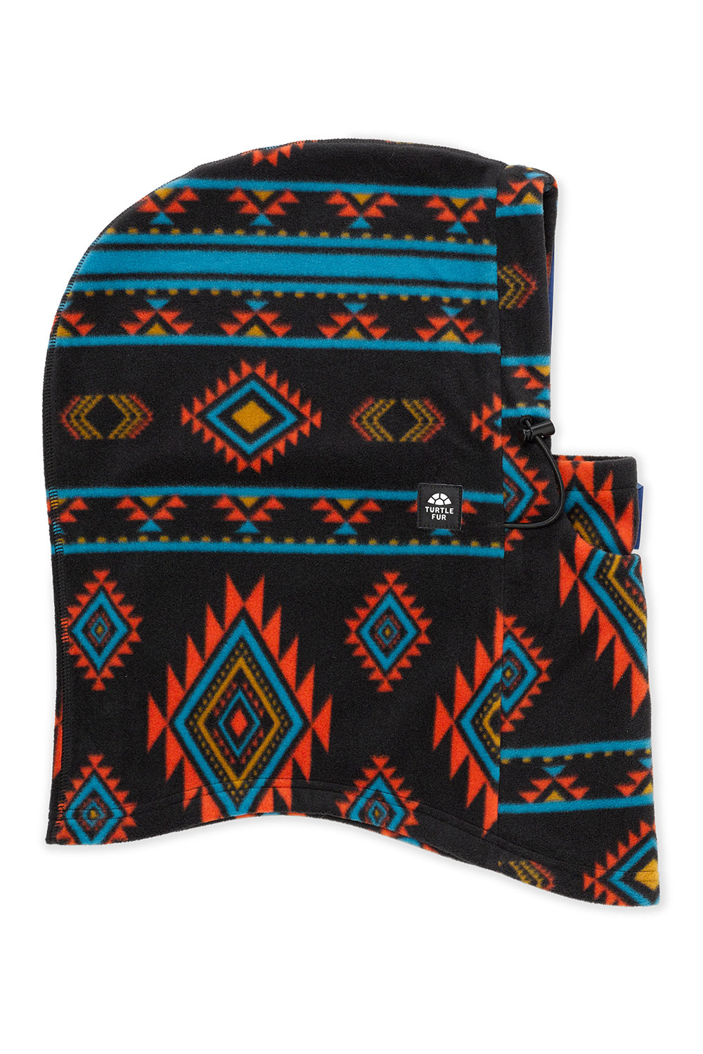 A fleece balaclava hood featuring a vibrant Southwestern geometric pattern in orange, turquoise blue, yellow, and black, with a small black brand tag on the side.