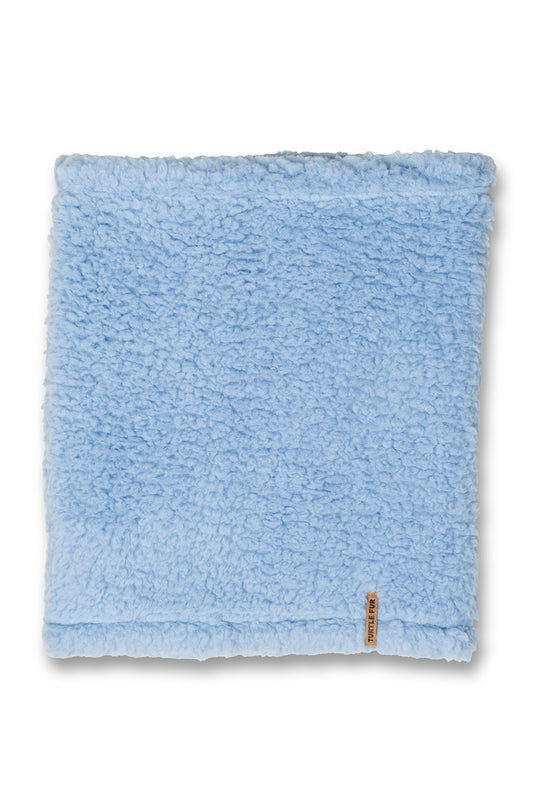 A light blue fleece neck tube with a small brown fabric brand tag on the bottom right corner, shown against a plain white background.
