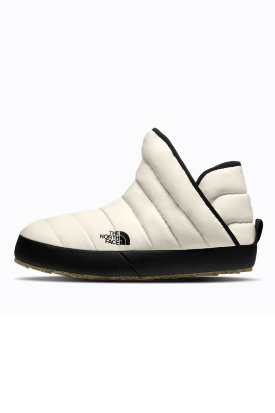 White and black slip-on boot with The North Face logo on a white background