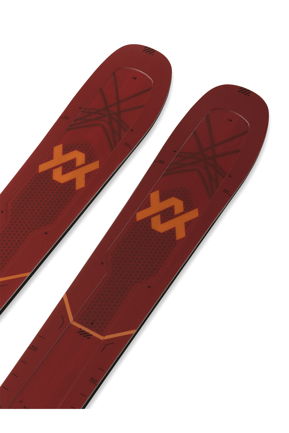Red skis with orange and black patterns on a white background