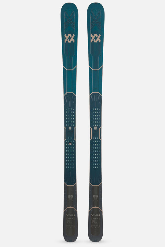 A pair of Volkl skis in a dark teal and black colorway with gold accents, shown vertically against a light gray background.