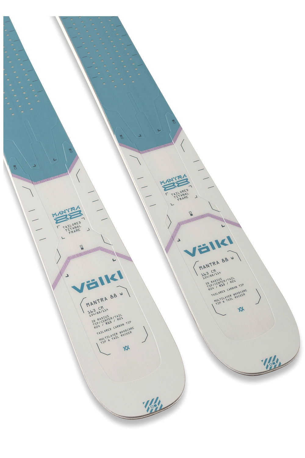 Pair of skis with visible branding on a white background