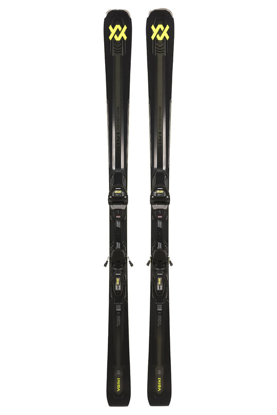 Pair of black skis with yellow branding on a white background