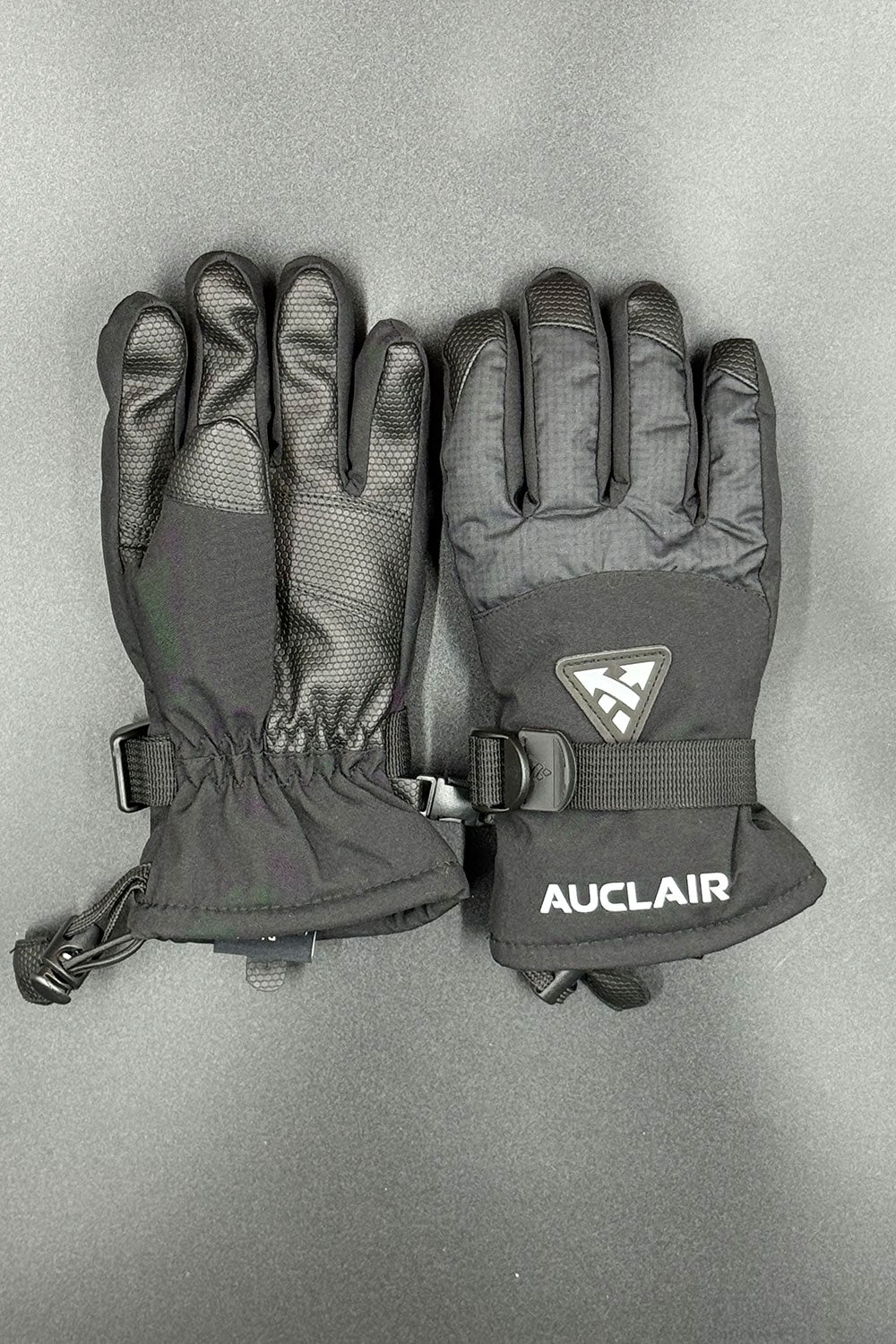 Black gloves with Auclair logo on a gray background