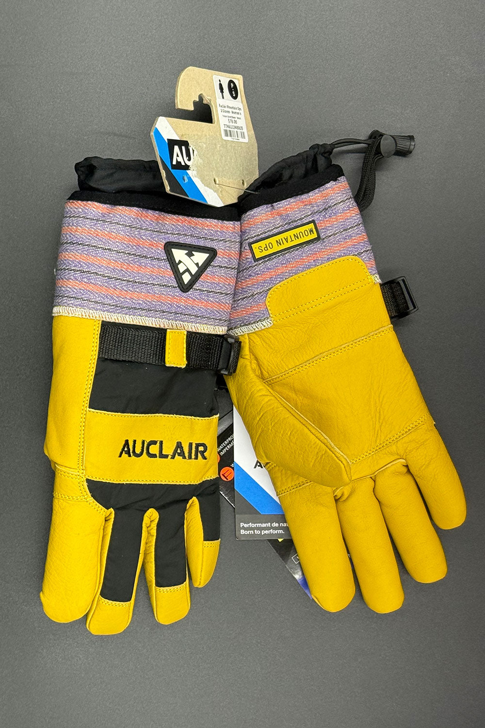 Yellow gloves with black accents and 'Auclair' branding on a gray background