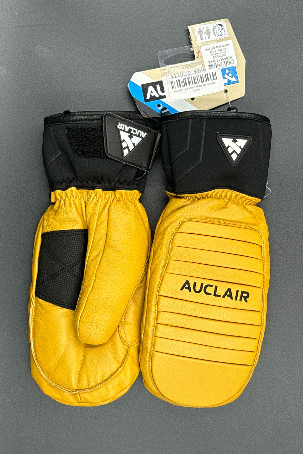 tan leather ski mitten with black accents

