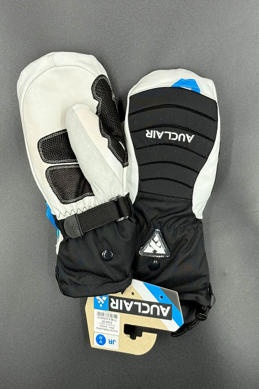 Pair of black and white gloves with 'Auclok' branding on a gray background