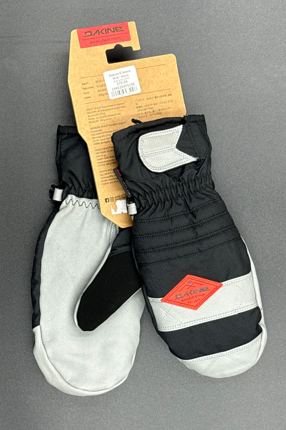 Black and light grey gloves with red logo on a gray background
