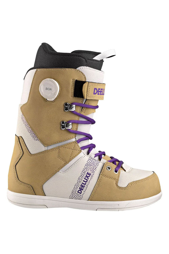 Tan and white snowboard boot with purple laces on a white background
