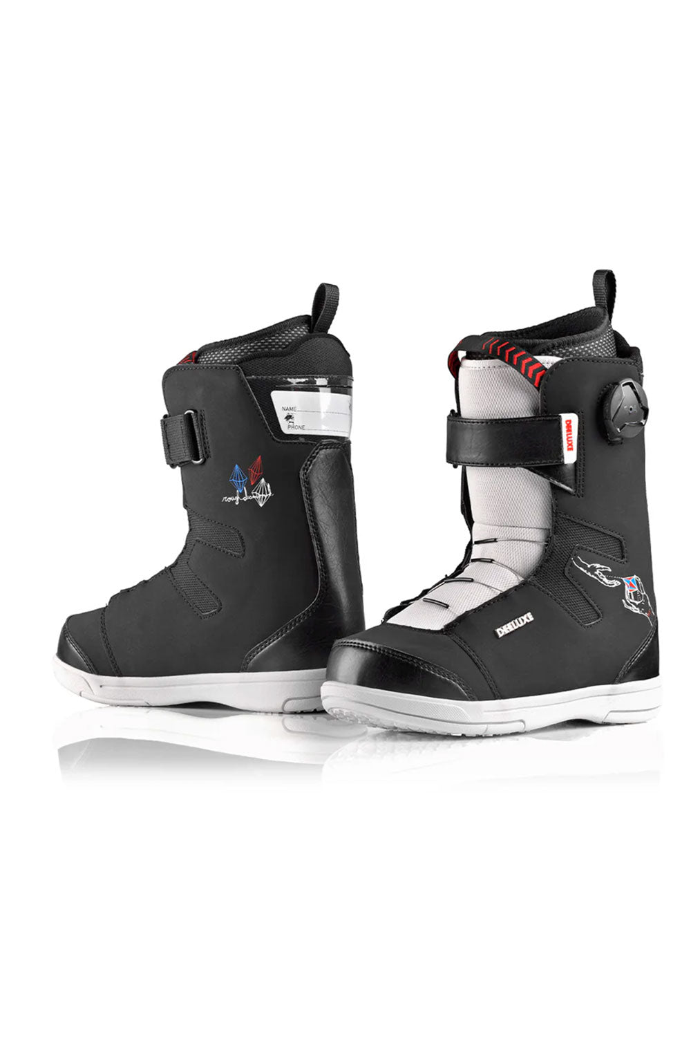 Black and white snowboard boots with visible branding on a white background
