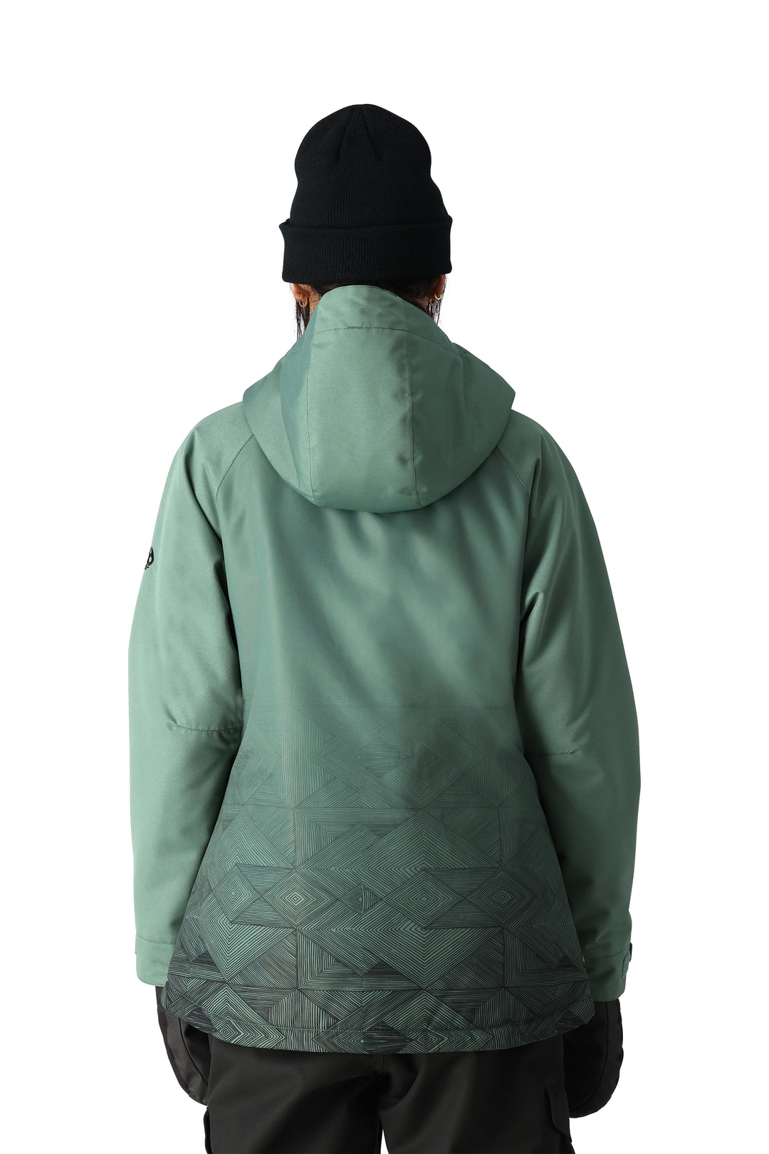 Women's 686 Fantasia snowboard jacket, Cypress green with black geometric pattern on bottom