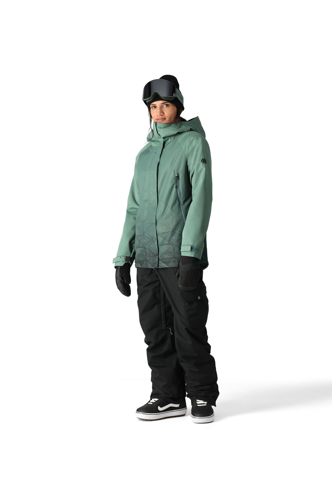 Women's 686 Fantasia snowboard jacket, Cypress green with black geometric pattern on bottom