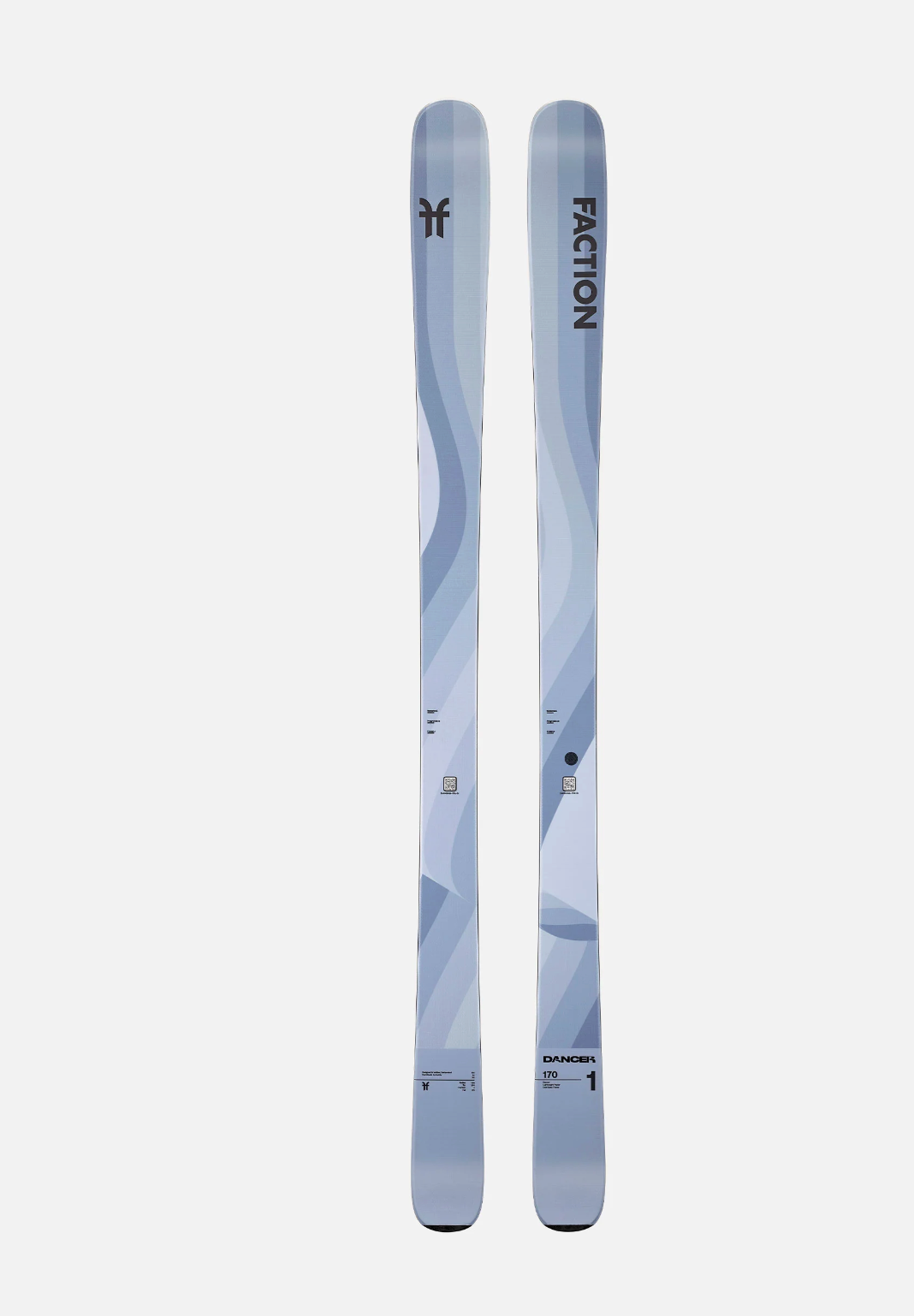 Two Faction skis on a white background