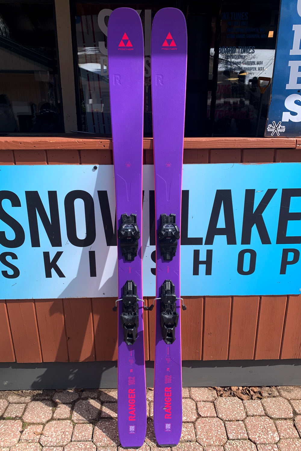 Fischer Ranger 102 demo skis,  purple with pink accents & black demo bindings