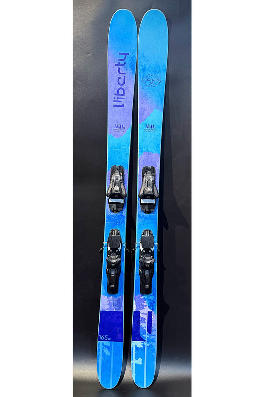 Blue skis with bindings on a black background