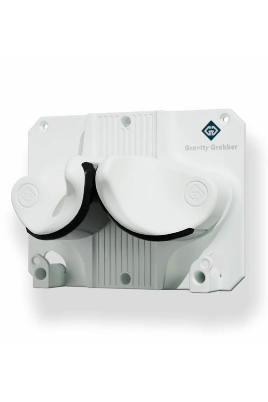 White mechanical device with two circular components on a white background