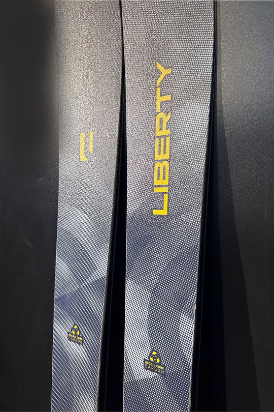 Gray bag with 'Liberty' branding on a black background