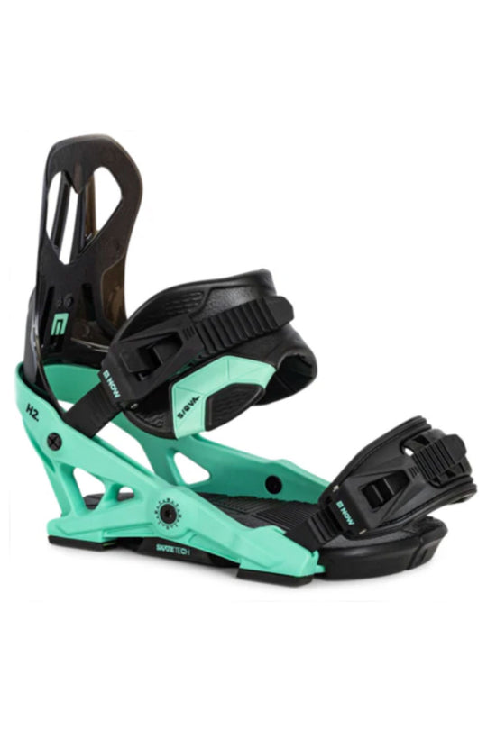 Teal and black snowboard bindings on a white background