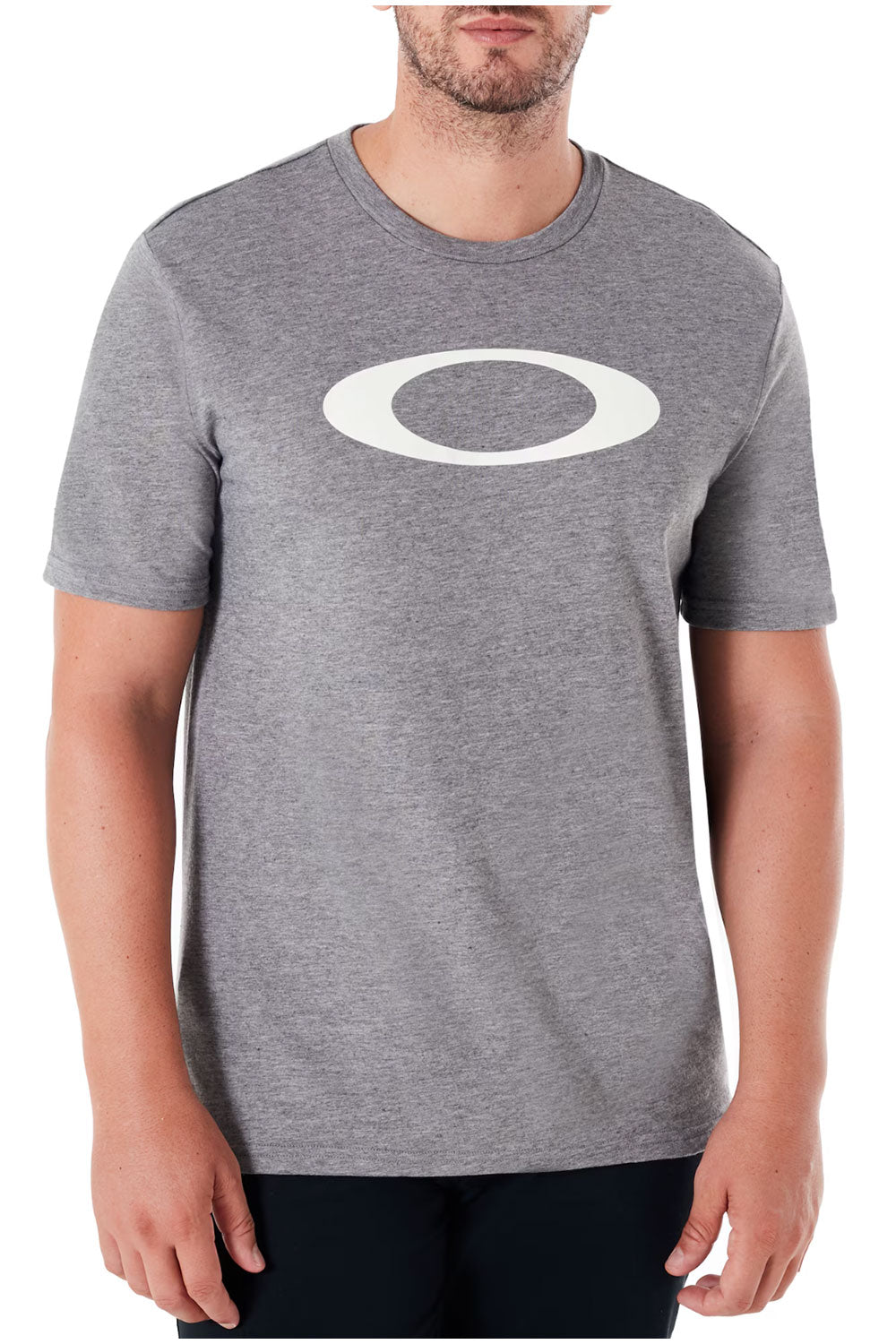 Gray t-shirt with a logo worn by a person on a white background