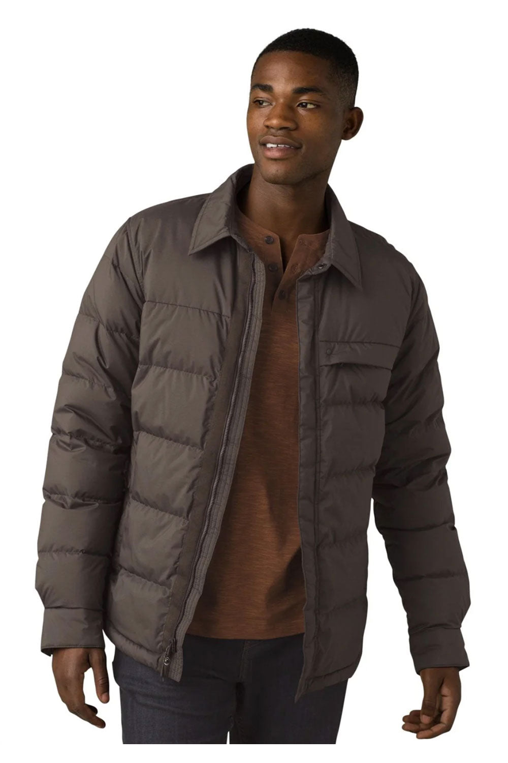 Man wearing a brown puffer jacket on a white background
