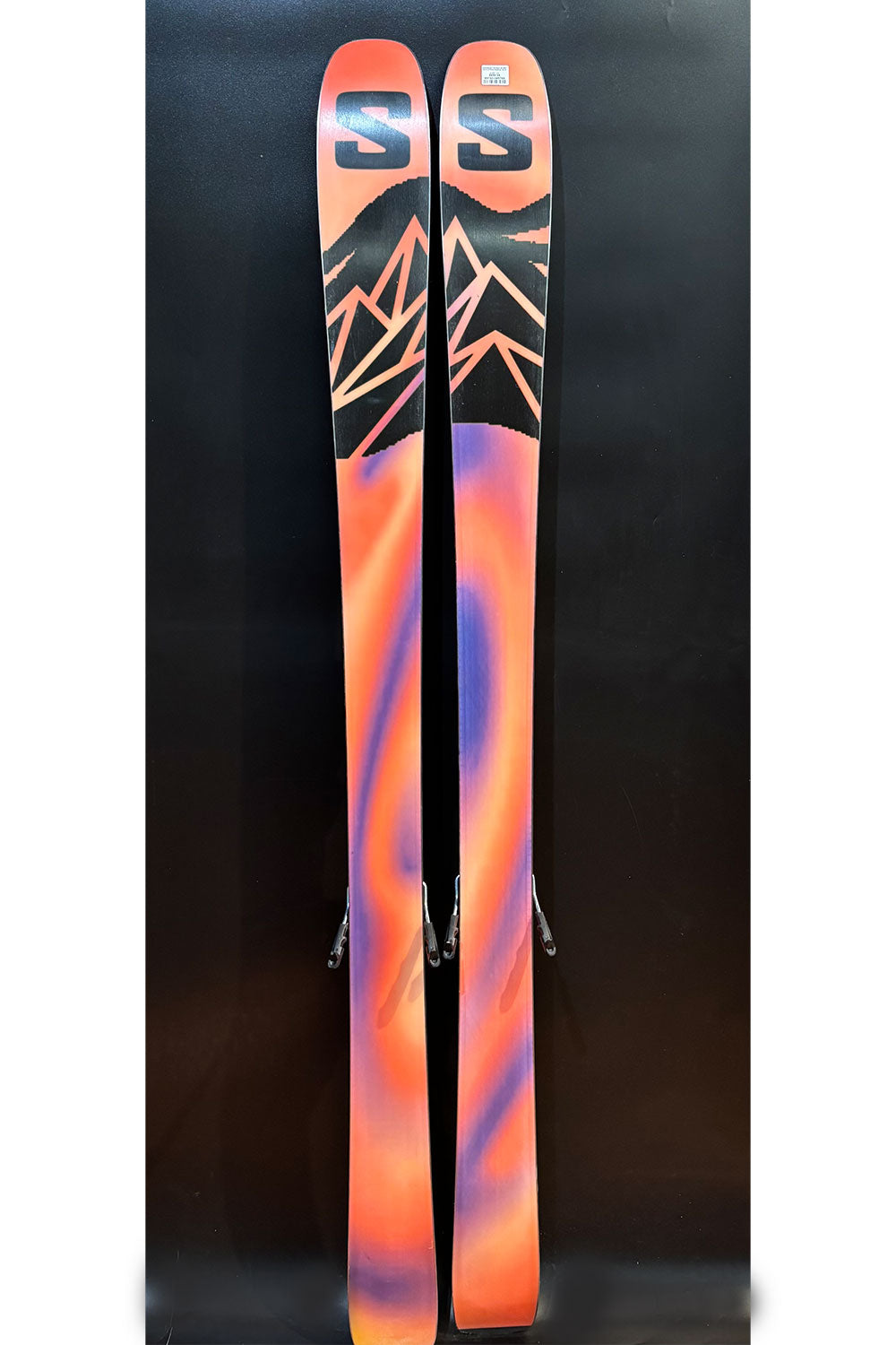 Ski with colorful design on a black background