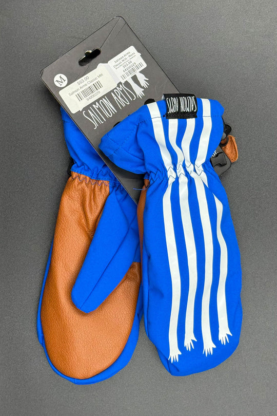 Pair of blue mittens with white stripes on a gray background