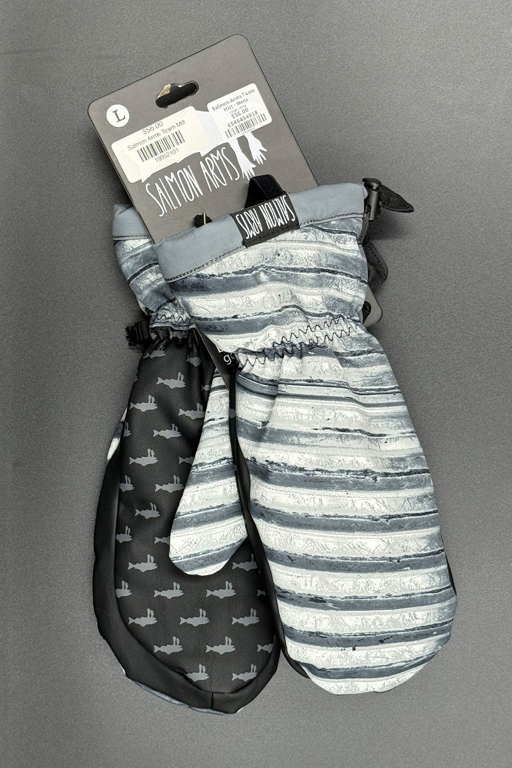 Pair of mittens with patterned design on a gray background