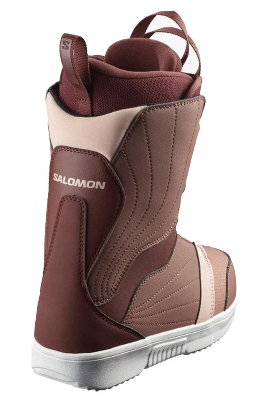 Dusty Pink snowboard boot with white sole on a white background