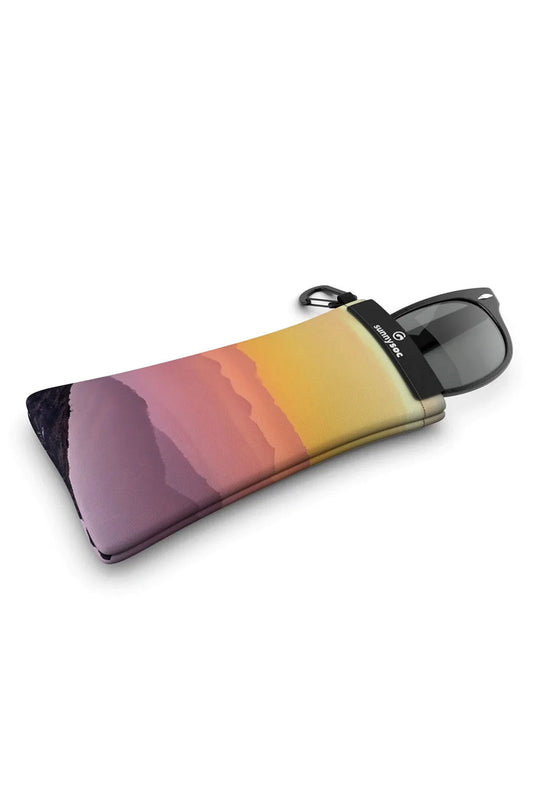 Sunglasses with a colorful case on a white background