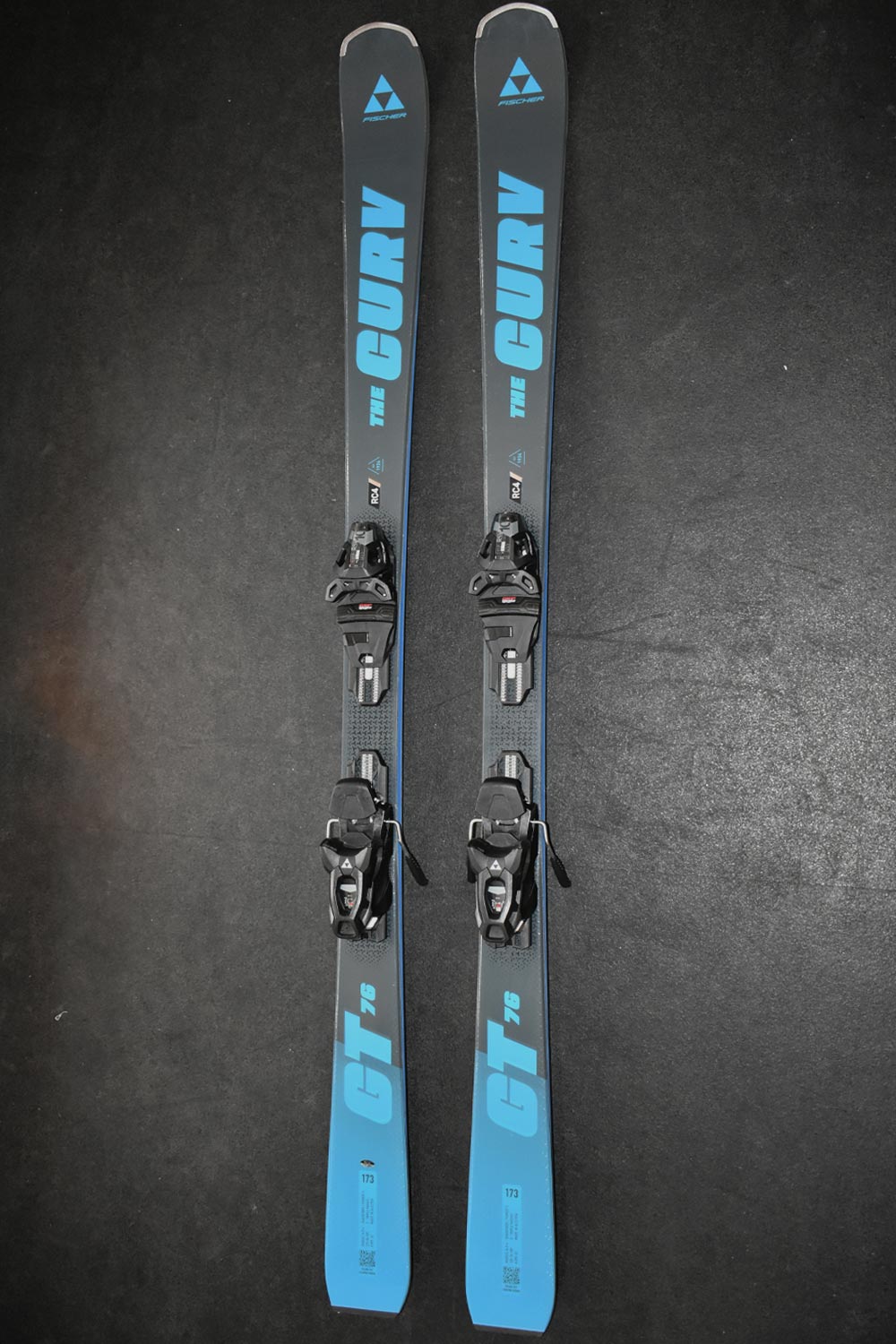 Fischer RC4The Curv demo skis, blue and gray with black bindings