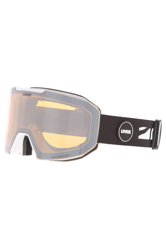 Ski goggles with a reflective lens on a white background