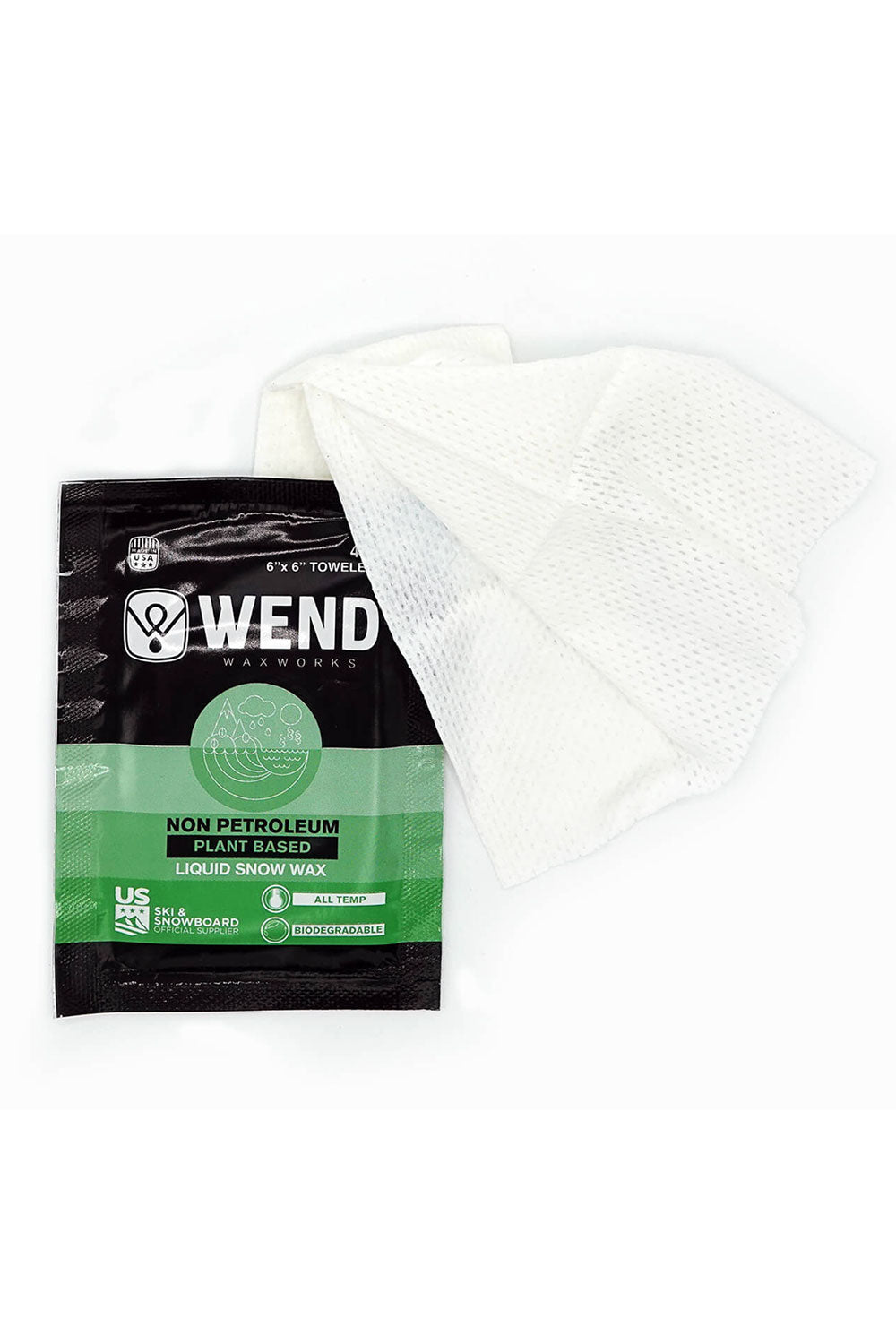 Wend liquid snow wax packaging with a white towel on a white background