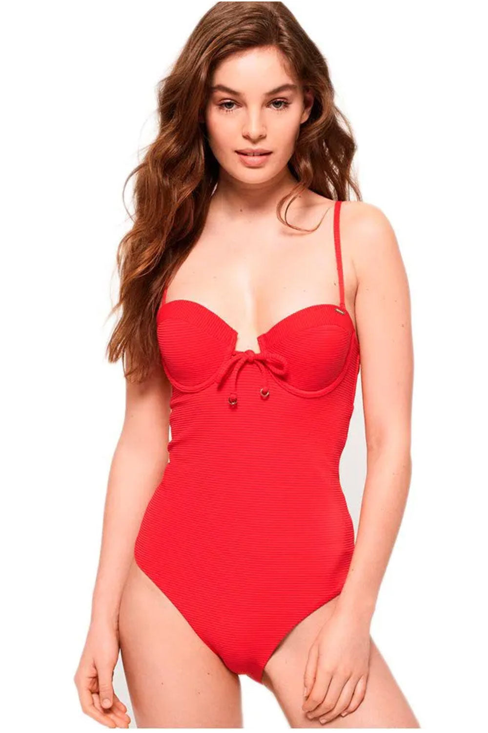 Woman wearing a red swimsuit on a white background